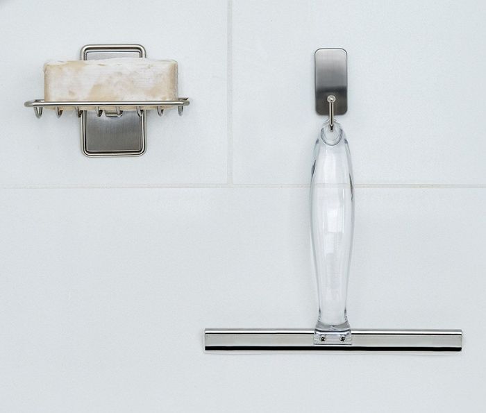 the squeegee mounted in the shower
