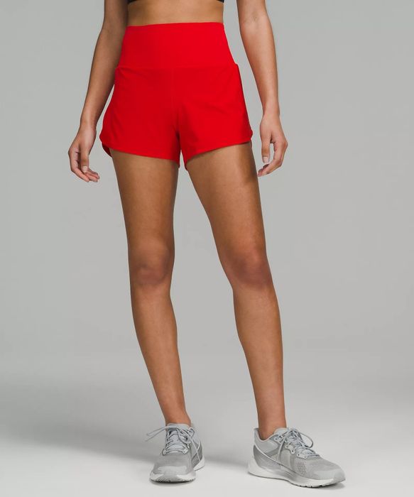 Image of a model wearing red shorts