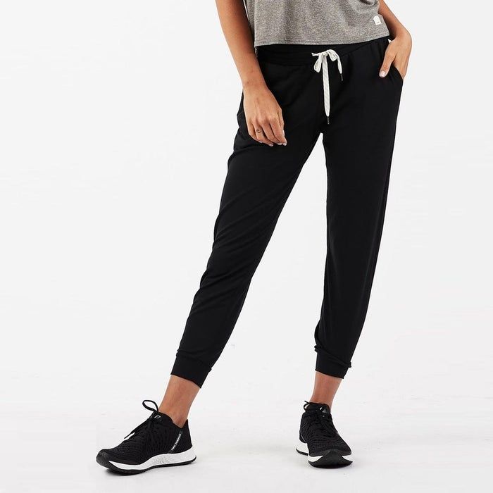 Model showcasing black joggers