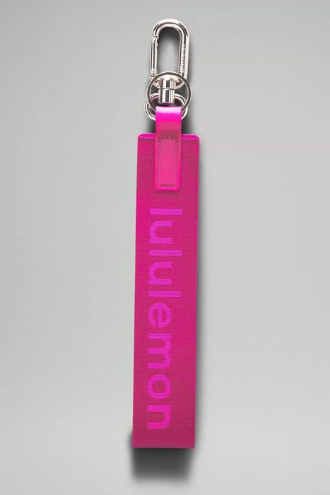 A photo of a pink keychain