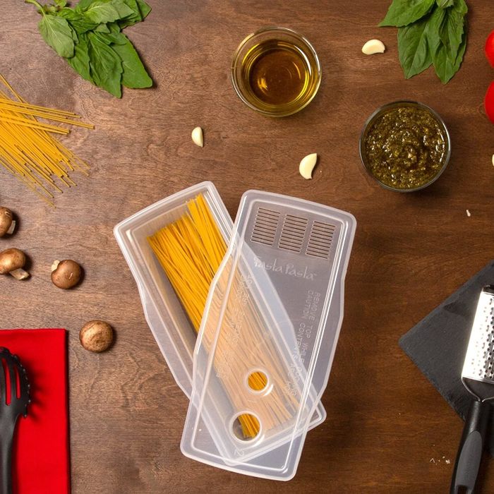 The pasta maker filled with uncooked pasta