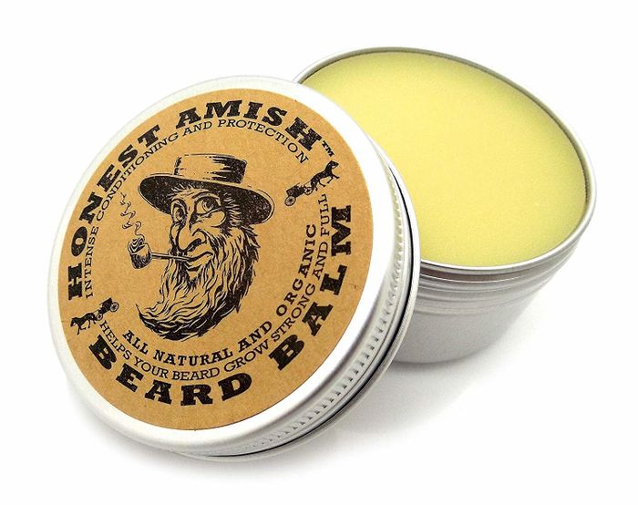 The beard balm stored in a sleek tin.