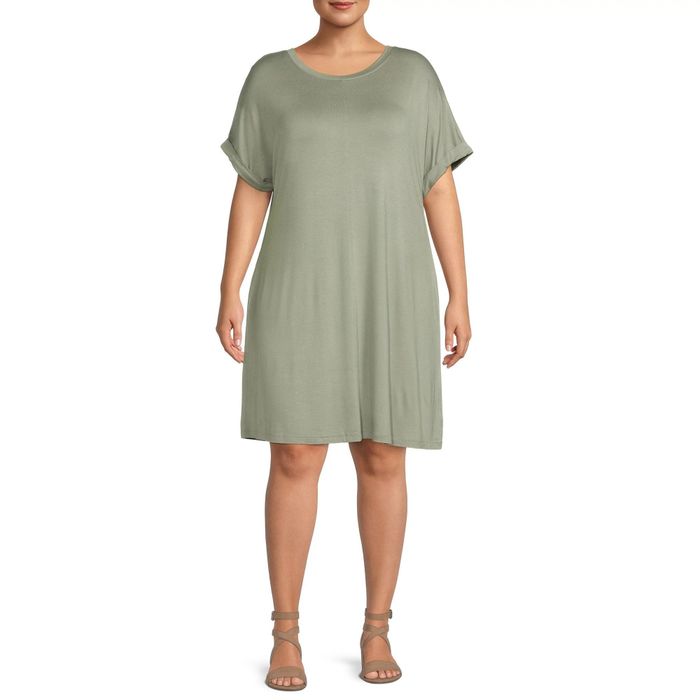 Model sporting a green T-shirt dress, the ultimate in comfort and ease.