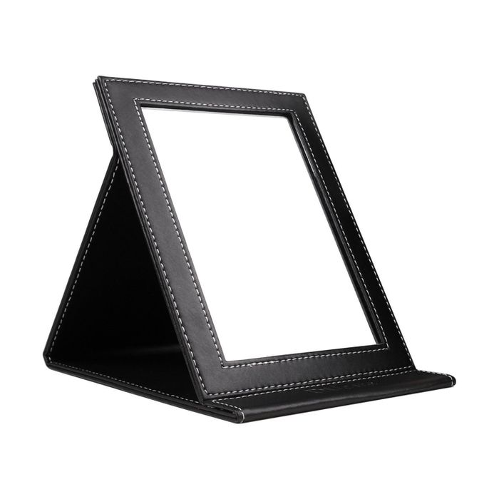 a mirror on the desk
