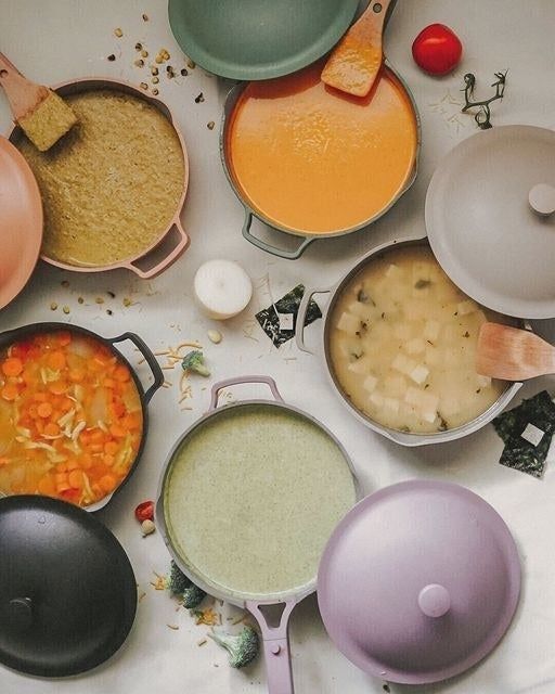 The Always Pan displayed in several vibrant colors.