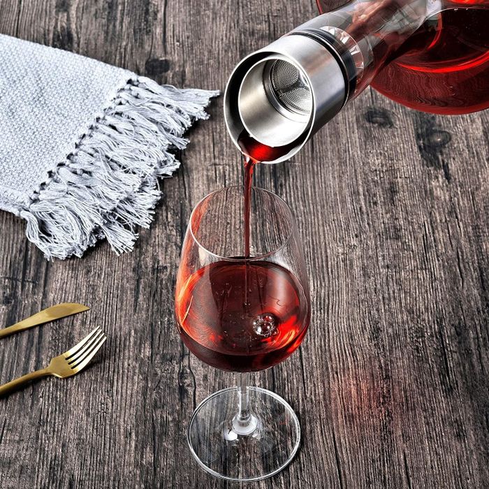 Pouring wine from the decanter into a glass