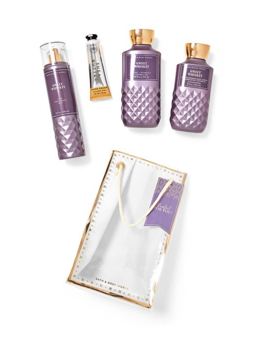 The gift set with all items displayed outside of the gift bag.