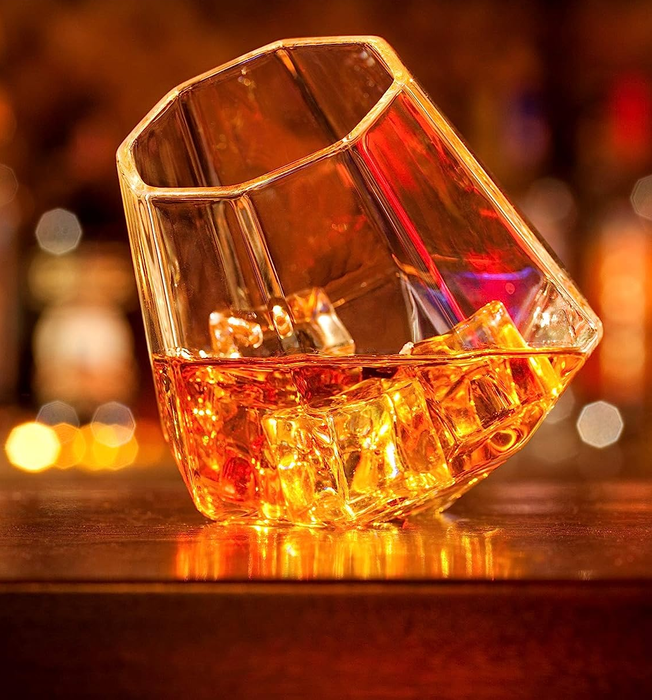 Whiskey served in diamond-shaped tumblers, a refined and stylish choice for any whiskey enthusiast.