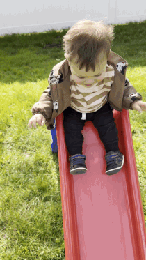 Mytour editor's son sliding down a Little Tikes slide