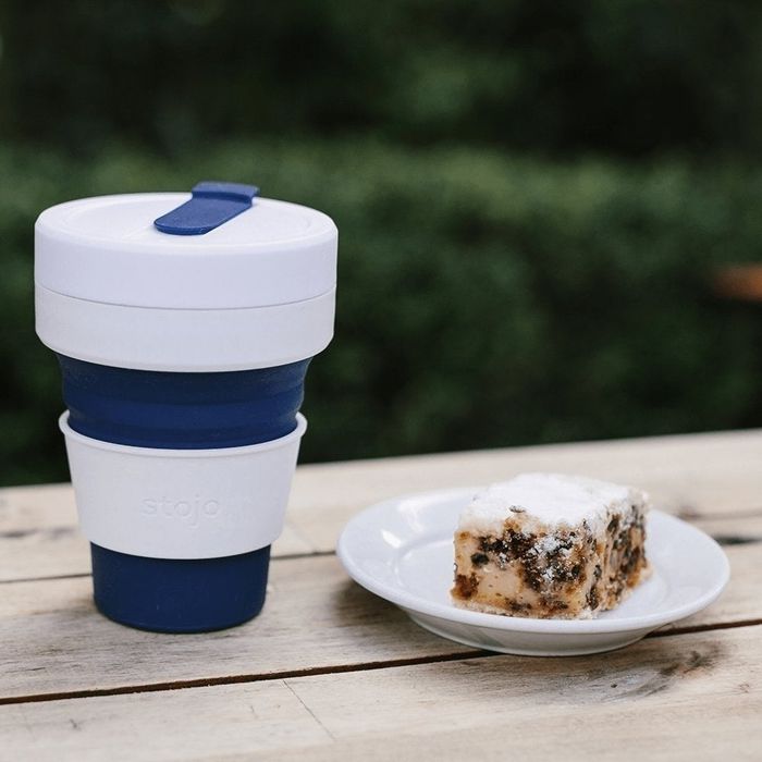 A navy blue cup with crisp white details