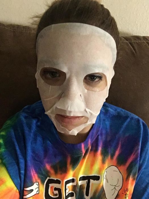 Reviewer wearing the sheet mask
