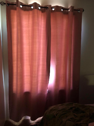 A reviewer’s soft pink blackout curtains