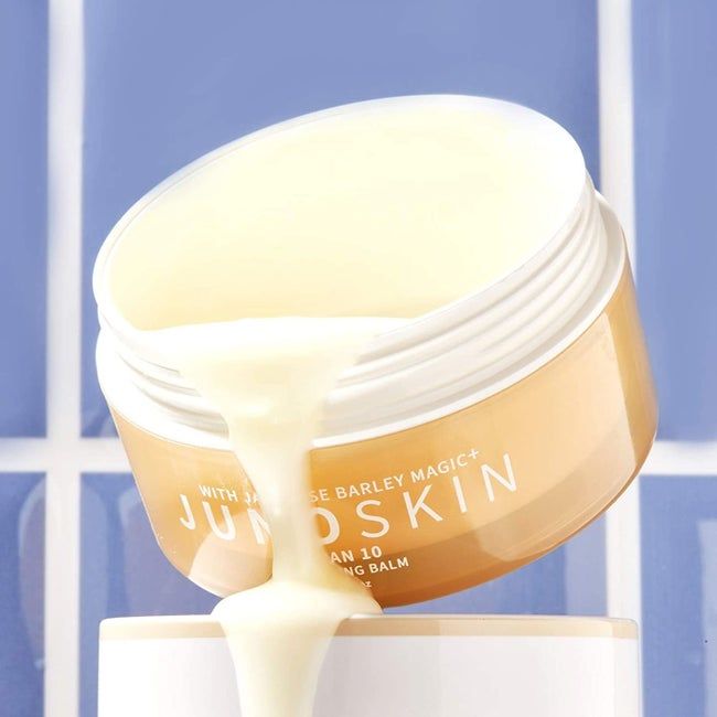 the rich, yellowish cream smoothly pouring out of the container