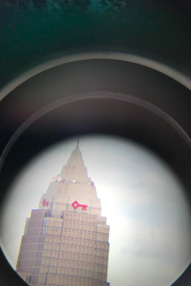 The telescope offers a crystal-clear view of the top of a building.