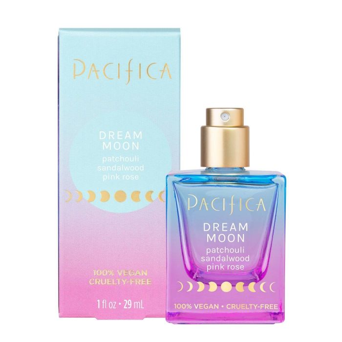 The bottle of perfume next to the box