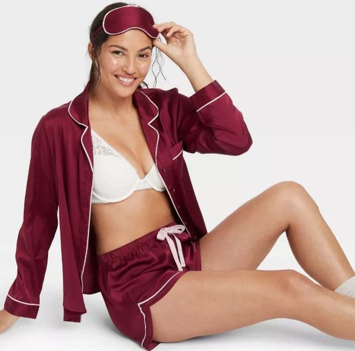A model sporting the PJs and sleep mask