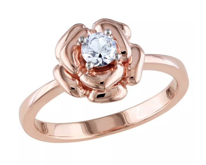 The pink silver flower-shaped ring