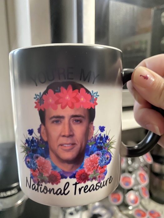 A reviewer's photograph showcasing the mug.