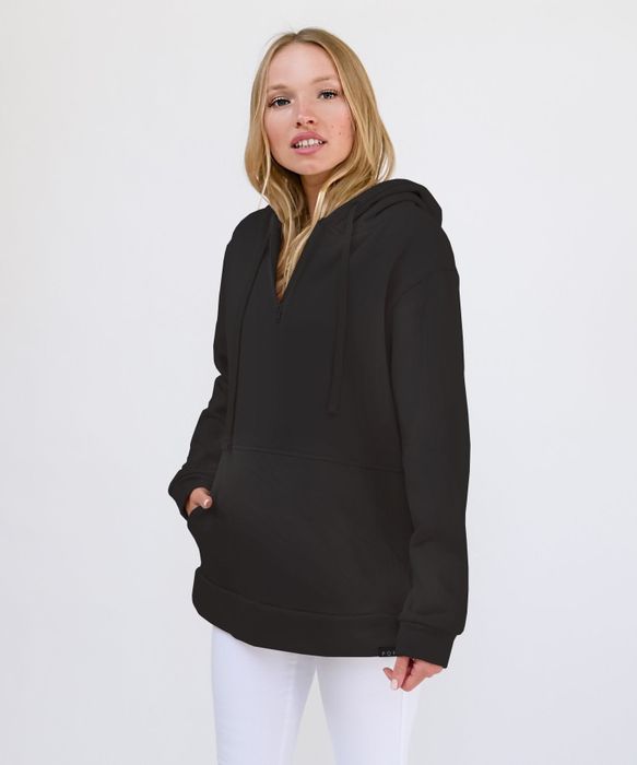 Model showing off the same hoodie in a sleek black version