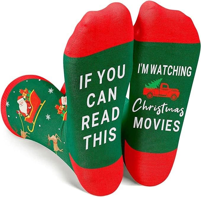 Red and green socks with the phrase written on the bottom: 
