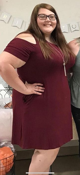 Reviewer wearing the wine red dress