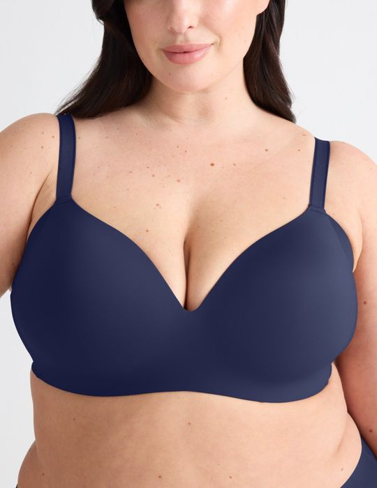 A model showcasing a navy bra.