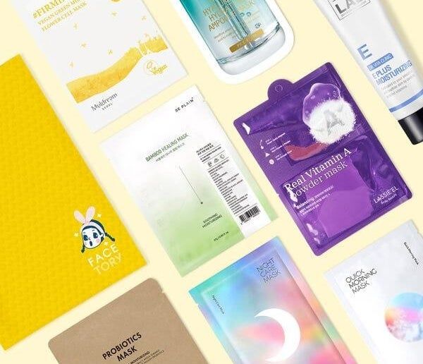 A yellow envelope with the word 'facetory' on it, surrounded by various face masks