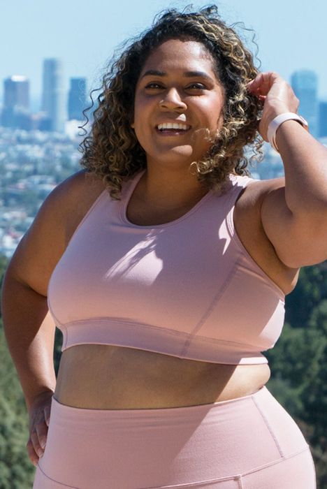 The model is wearing the blush pink bra.