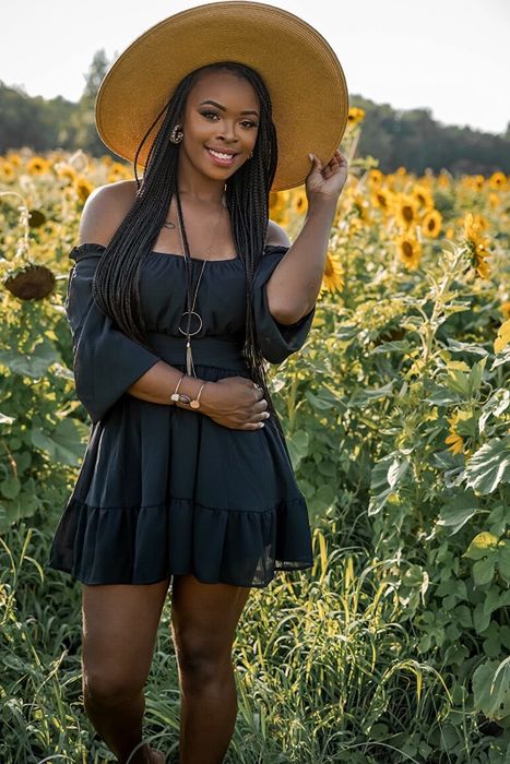 Reviewer wearing the black lantern sleeve dress