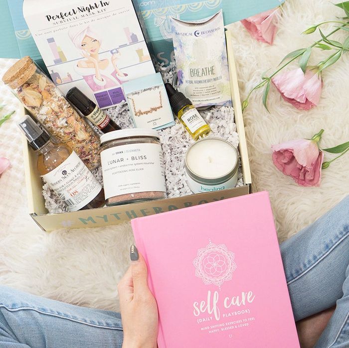 A model holding a book titled 
