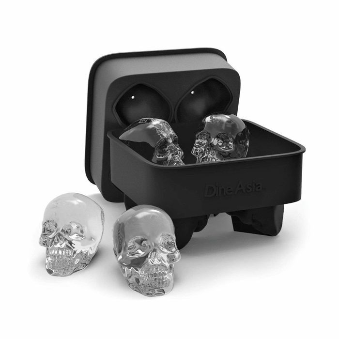 The mold that creates two large skull-shaped ice cubes