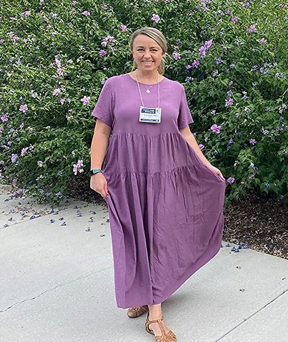 A reviewer rocking the lavender dress.
