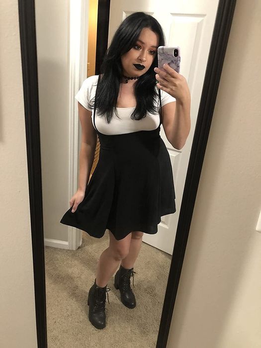 A reviewer seen rocking the classic black dress.