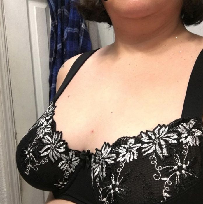 A reviewer sporting the bra in sleek black.