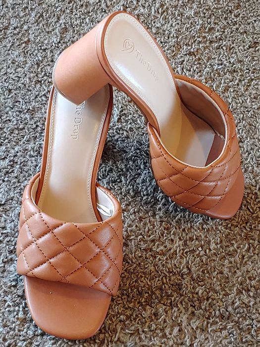 Review image featuring the tan mules