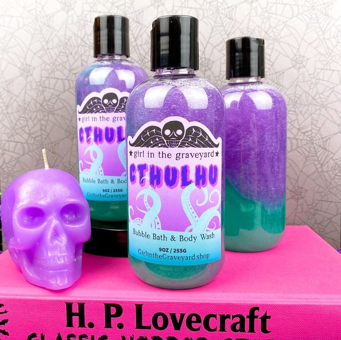 Three bottles of purple and green bubble bath and body wash, each labeled with the word 'Cthulhu'.