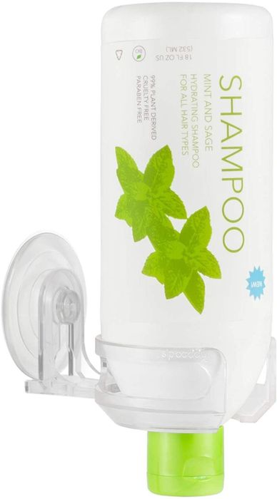 An upside-down shampoo bottle resting in its holder, making it easy to use every last drop