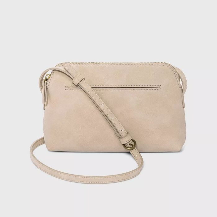 The tan purse.