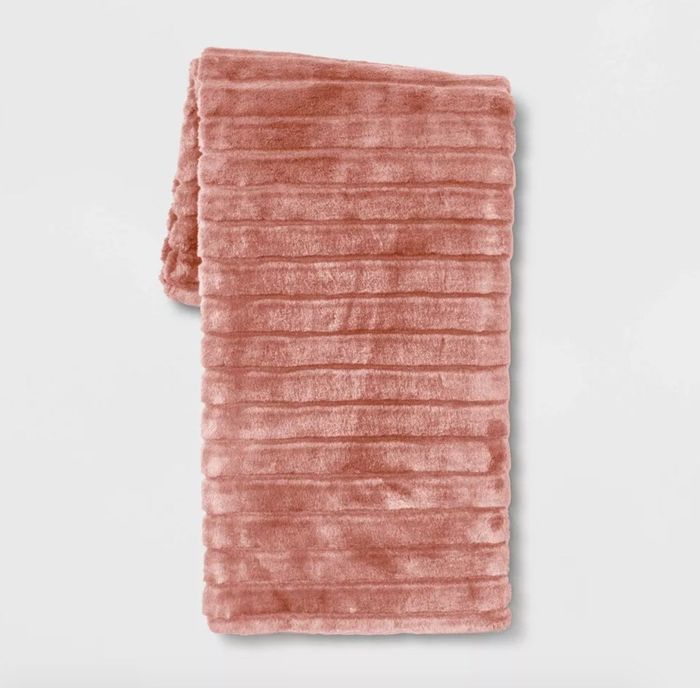 The blanket in pink.