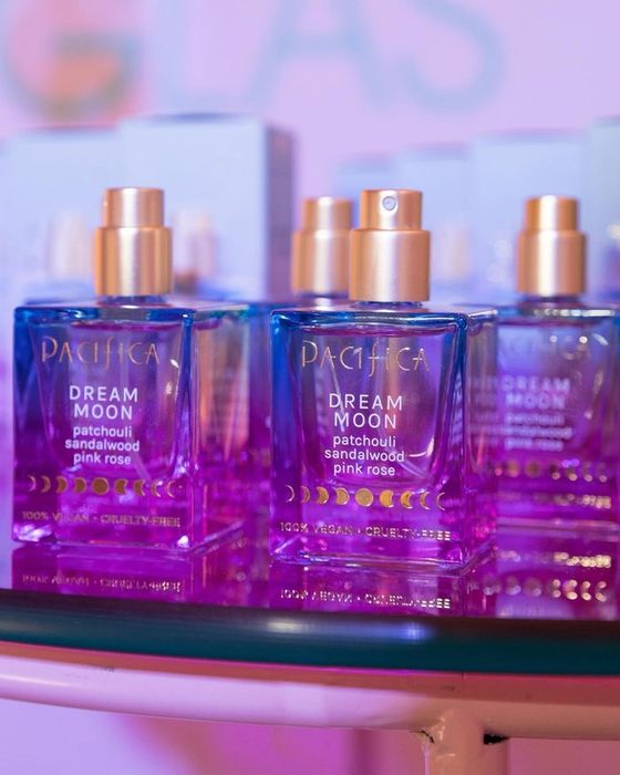 the beautifully designed purple perfume bottle