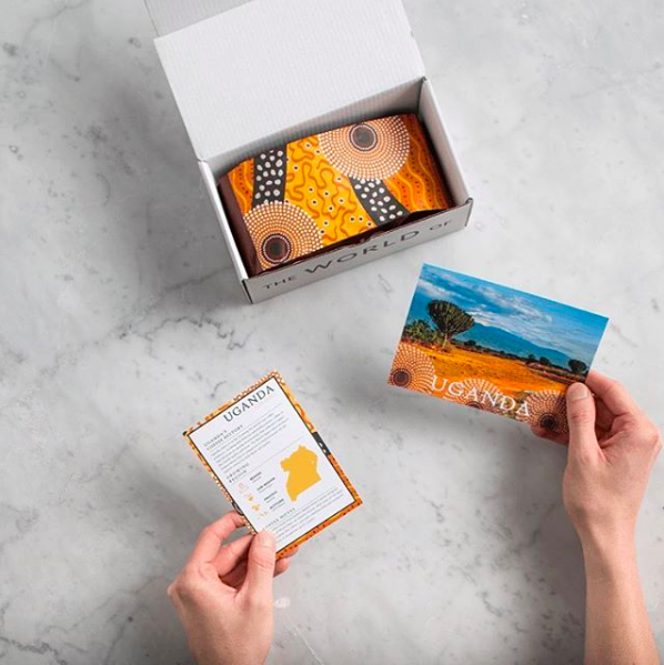 A person unboxing a shipment of coffee.
