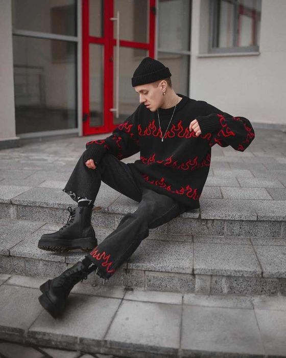 A model confidently sporting the vegan Dr. Martens boots, showcasing their versatile and stylish design.