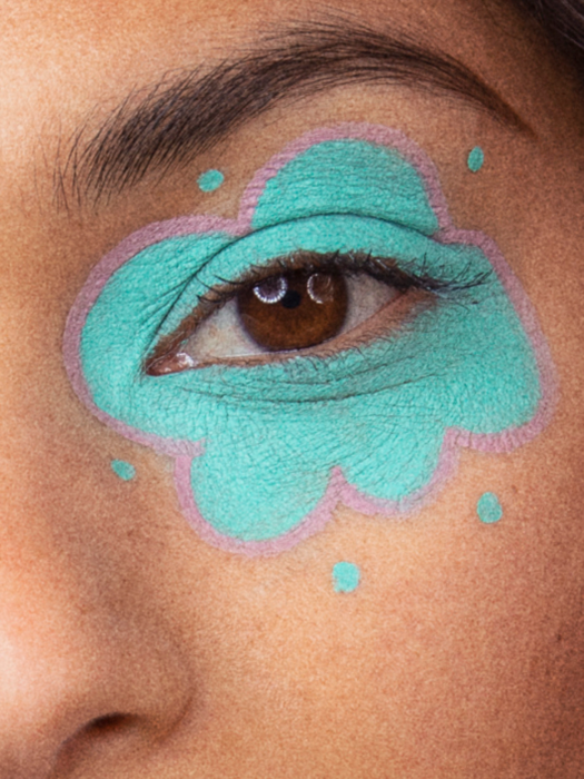 Eye with blue paint around it