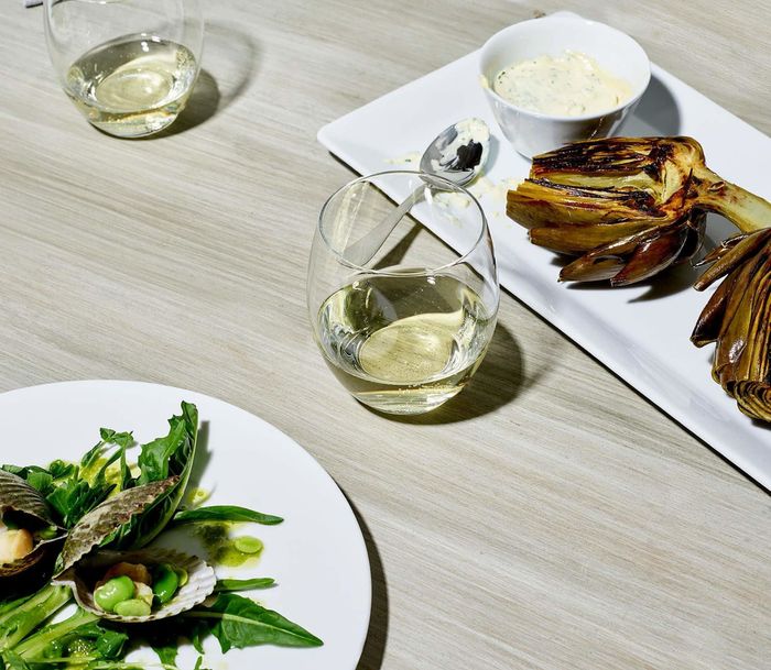 Stemless wine glasses placed elegantly on a dinner table, perfect for any occasion.