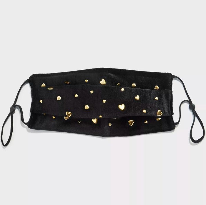 The gold velvet face mask.