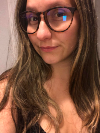 Another reviewer also wearing the blue-light-blocking glasses, showing off their stylish and functional look.