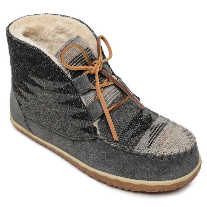 The grey boots, featuring suede sides with a printed fabric design over the toes and along the sides.