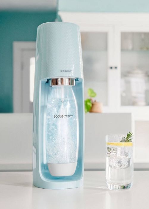 The SodaStream, a light blue device that carbonates one bottle of water at a time, turning it into sparkling water.