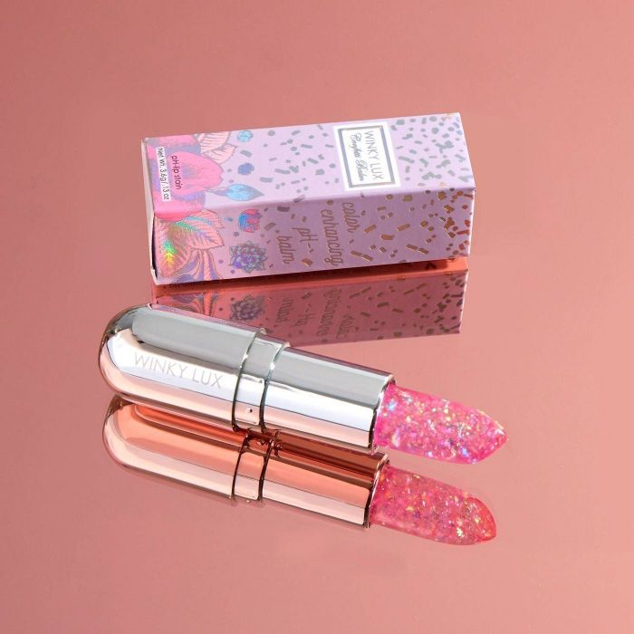 The lip stain, which appears clear with glitter suspended inside.