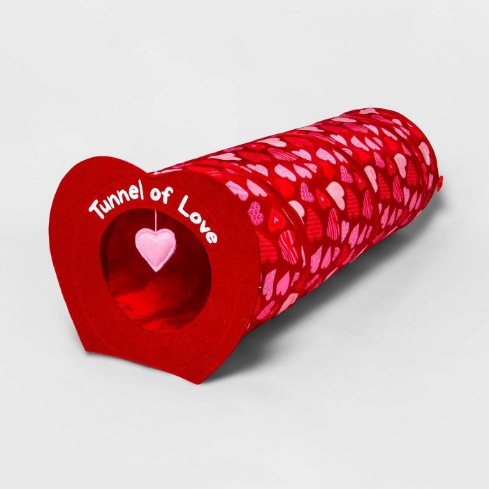 The tunnel boasts a heart-shaped entrance and features a foldable, heart-patterned tube design.